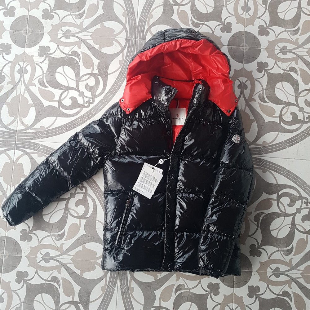 Men inside red Black Moncler coat